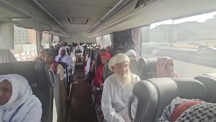 Pilgrims aboard a Madni Ziyarat coach