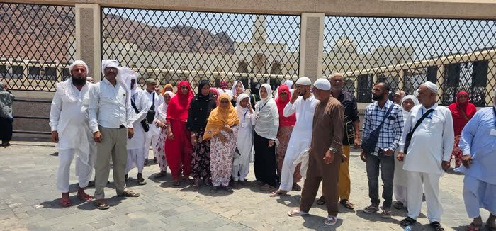 A Madni Tour group photographed together on Ziyarat