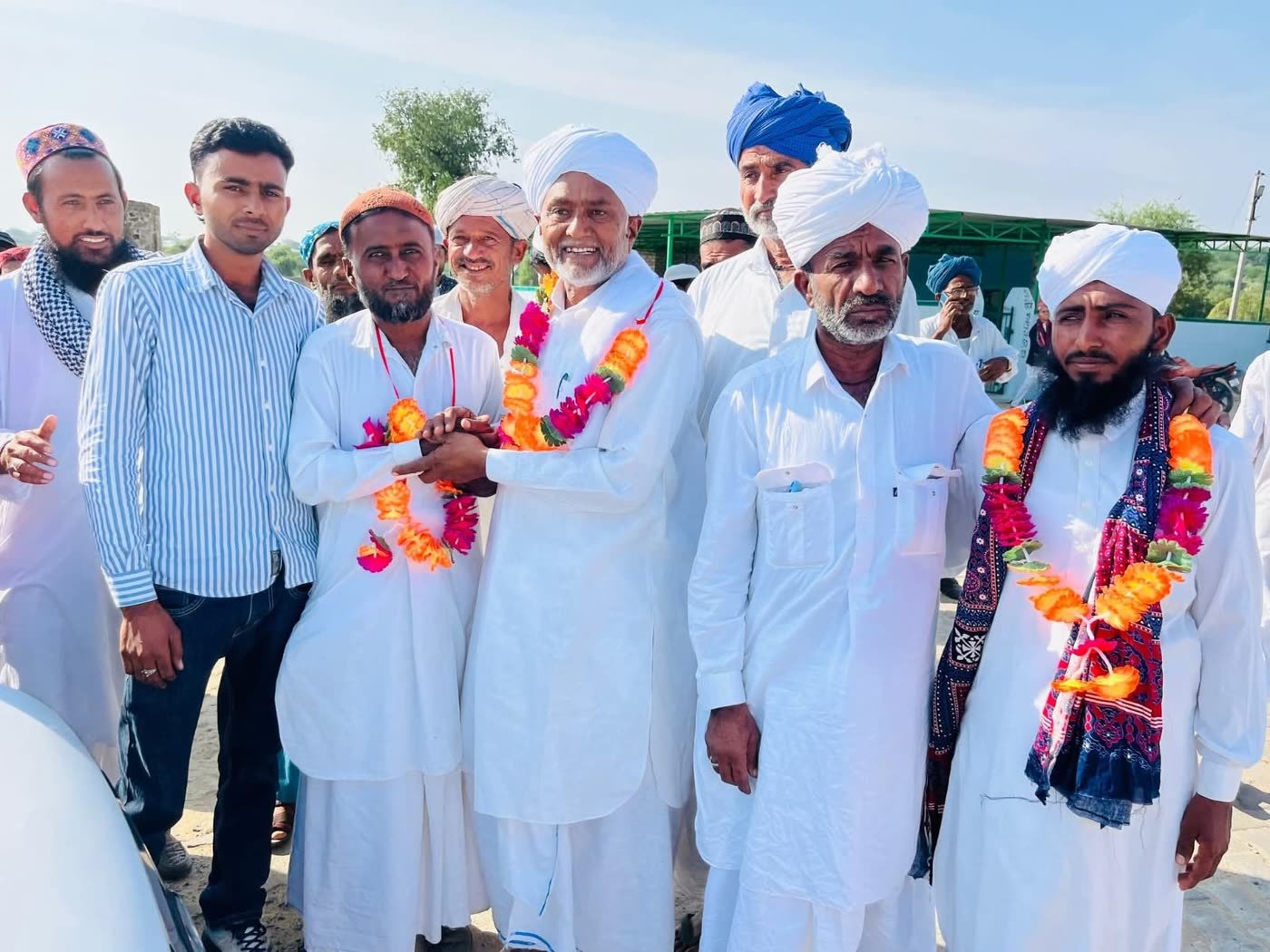 Pilgrims garlanded before leaving for Umrah