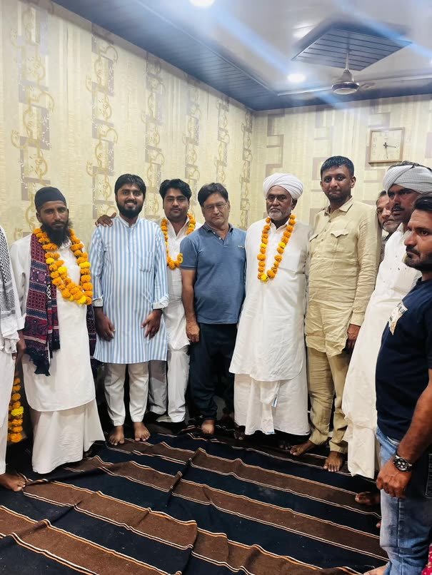 A send-off gathering before a Madni departure